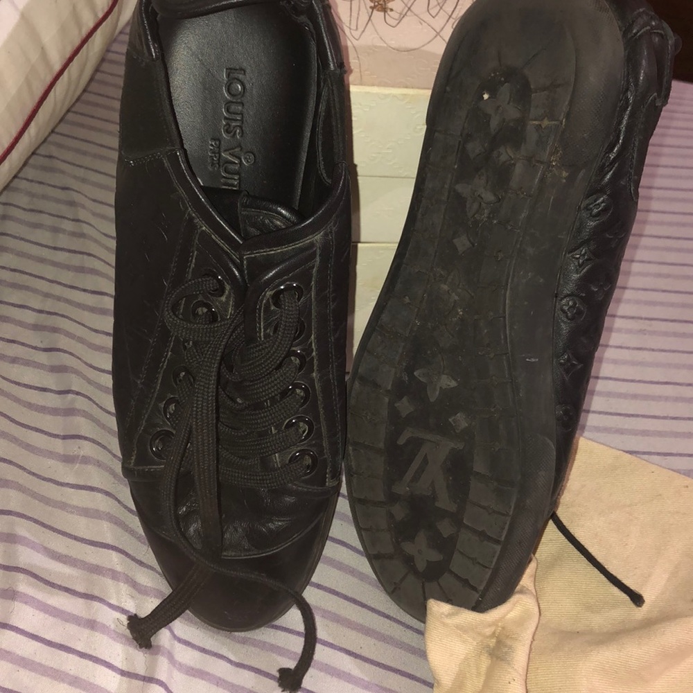 Louis Vuitton’ black sneakers
